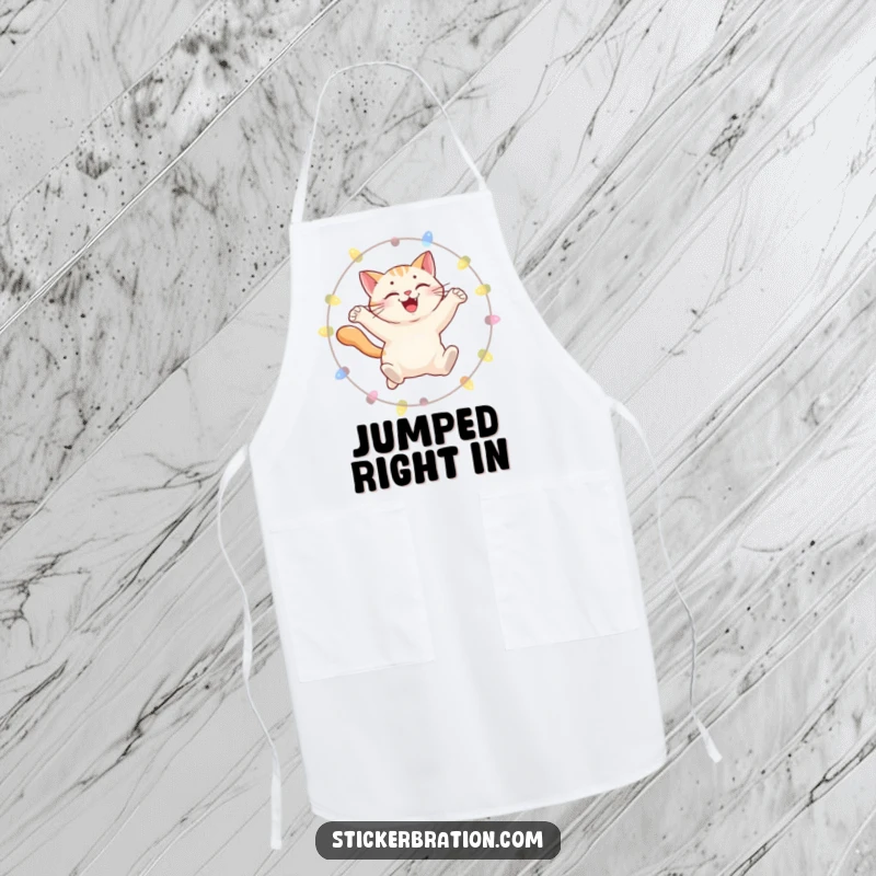 Funny apron with a smiling cat leaping through a hoop of lights, designed for cooks who enjoy playful kitchen humor.