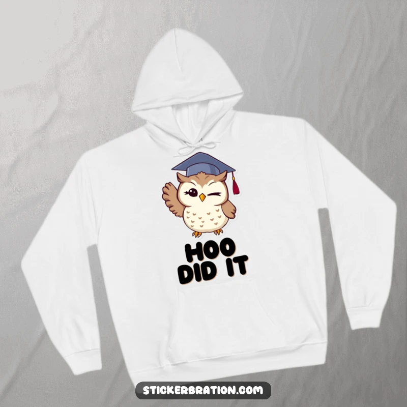 Funny owl hoodie with a winking graduate owl wearing a cap and tossing it up, providing cozy warmth and celebratory vibes.