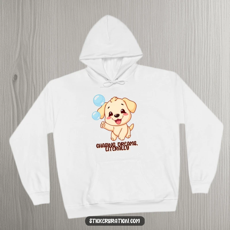 Funny hoodie depicting a joyful puppy character playfully engaged in chasing a mesmerizing flurry of bubbles.