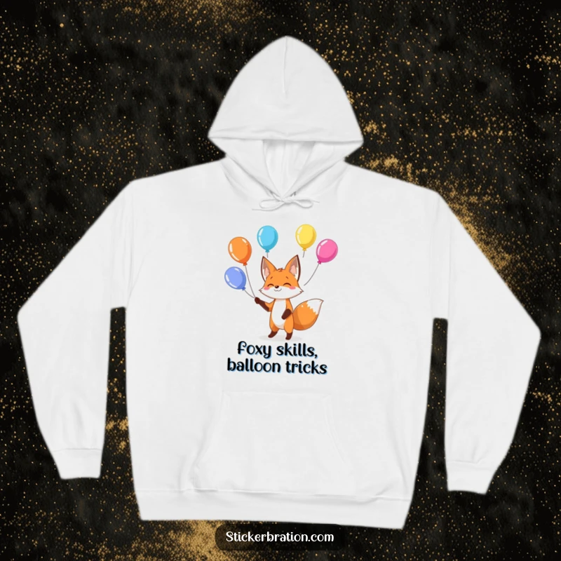 Funny fox hoodie showing a playful character juggling colorful balloons, offering warmth and humorous style.