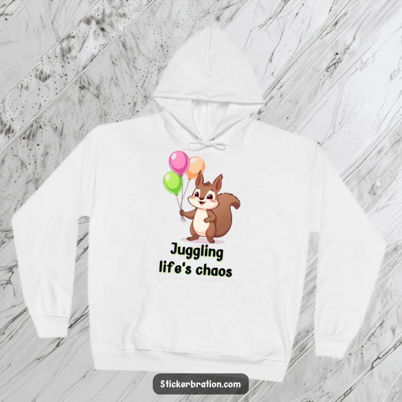 Funny squirrel hoodie depicting a mischievous character adeptly juggling colorful balloons, offering a cozy and humorous addition to any wardrobe.