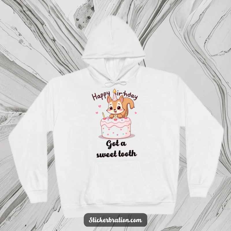 Funny hoodie featuring a mischievous squirrel character popping out of a birthday cake, perfect for cozy celebrations.