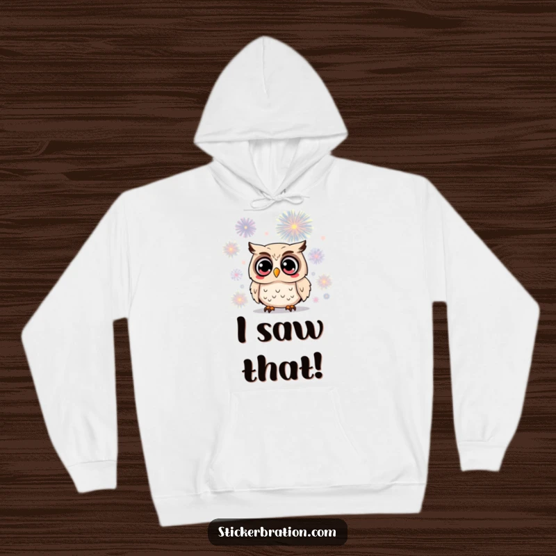 Funny owl hoodie depicting a surprised character with wide eyes watching a vibrant firework, offering a cozy and humorous expression of amazement.