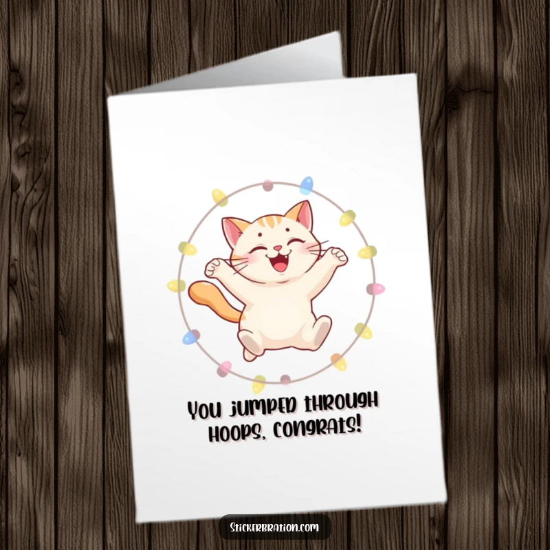 Funny Free Printable Congratulations Card with a smiling cat soaring through a hoop of lights, symbolizing achievement and brilliance.
