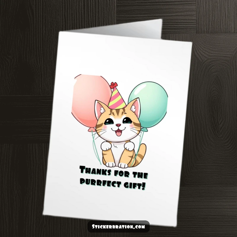 Funny Free Printable Thank You Card: A happy cat with a party hat peeking from behind colorful balloons, saying thanks.