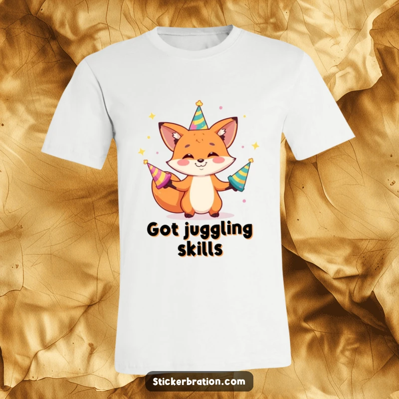 Funny t-shirt depicting a grinning fox character expertly juggling multiple shiny party hats, showcasing playful dexterity.